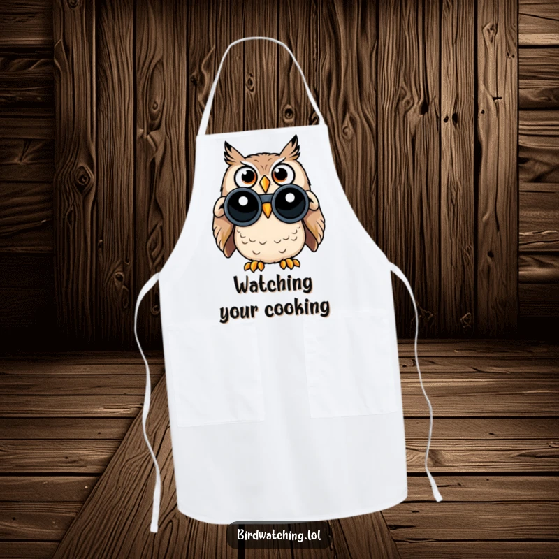 Funny apron showing a surprised owl with wide eyes, holding binoculars while ready to assist in the kitchen.