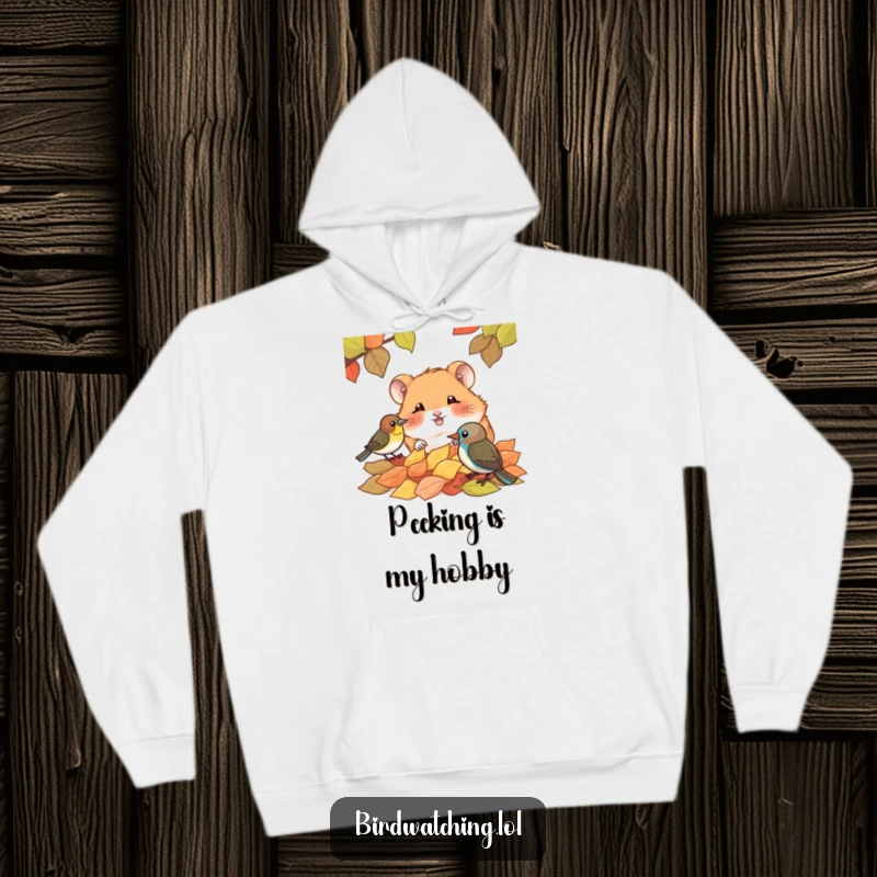 Funny hoodie showcasing a giggling hamster peeking through autumn leaves at a bird, offering warmth and a humorous woodland scene.