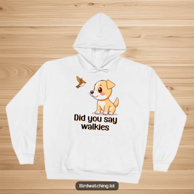 Funny dog with perked ears spotting a distant bird, featured on a warm and cozy hoodie.