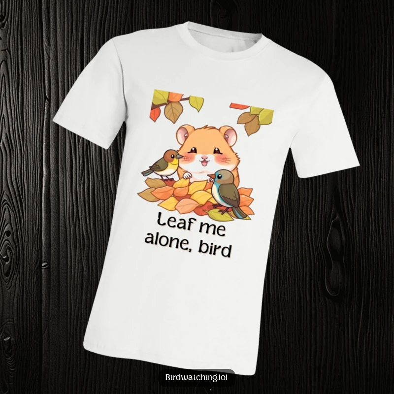 Funny t-shirt with a giggling hamster peeking out from behind autumn leaves, looking playfully at a small bird, embodying woodland fun.