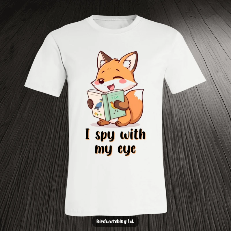 Funny t-shirt showcasing a gleeful fox hugging a bird identification book, perfect for nature lovers and those with a great sense of humor.