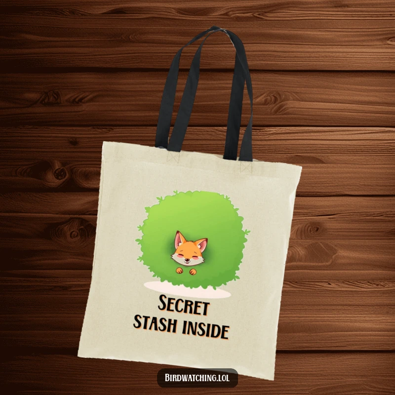 Funny tote bag showcasing a giggling fox hiding behind a bush, ready for fun and games.