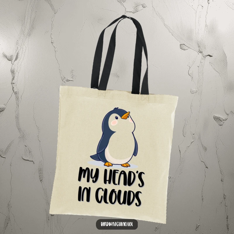 Funny tote bag with a wobbly penguin looking up at the sky with wonder, perfect for carrying essentials with a smile and whimsical flair.